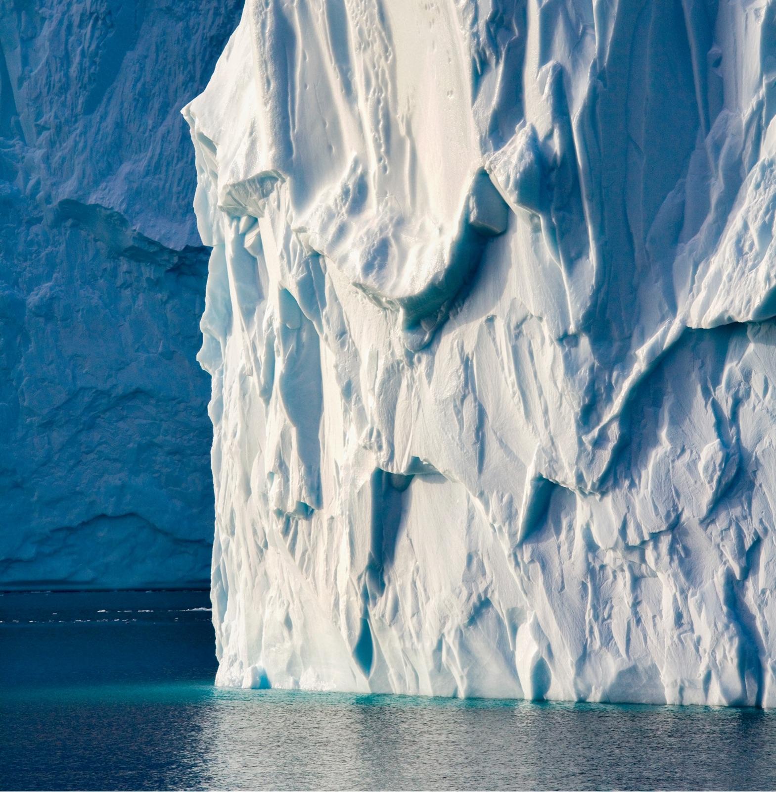 An expedition vessel among Arctic glaciers