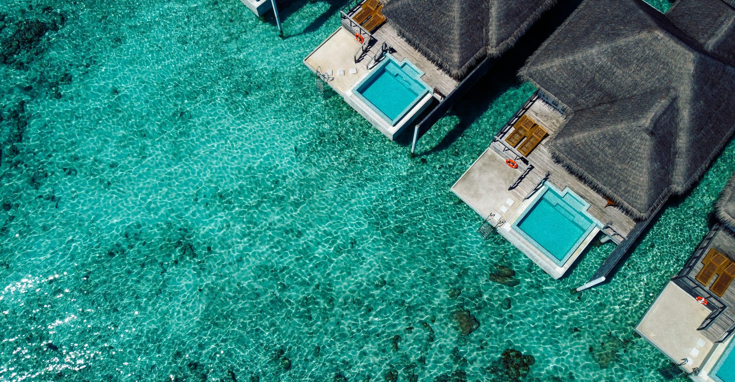 Aerial view of a Maldivian atoll at sunrise